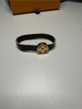 Louis Vuitton Black Leather Bracelet with Gold Flower Medallion